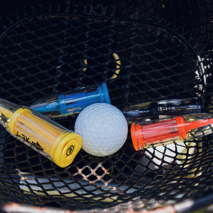 4 pack of golf brush performance tees in ball basket.